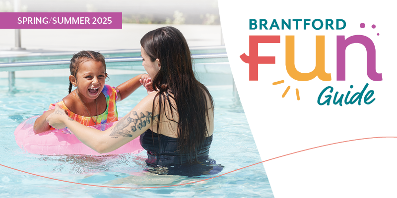 Mother and child in the pool with Brantford FUN Guide logo and City logo