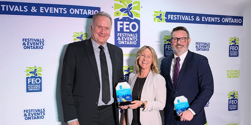 Image of Brantford Mayor Davis, Special Events Supervisor Jennifer Middleton and Steve McGaghran, Partner at Millards Chartered Professional Accountants holding the Sponsor of the Year FEO award