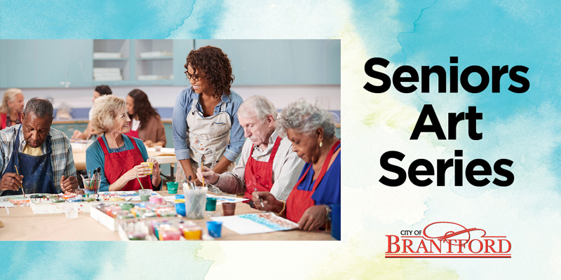 A group of seniors sit and paint while the instructor stands by them