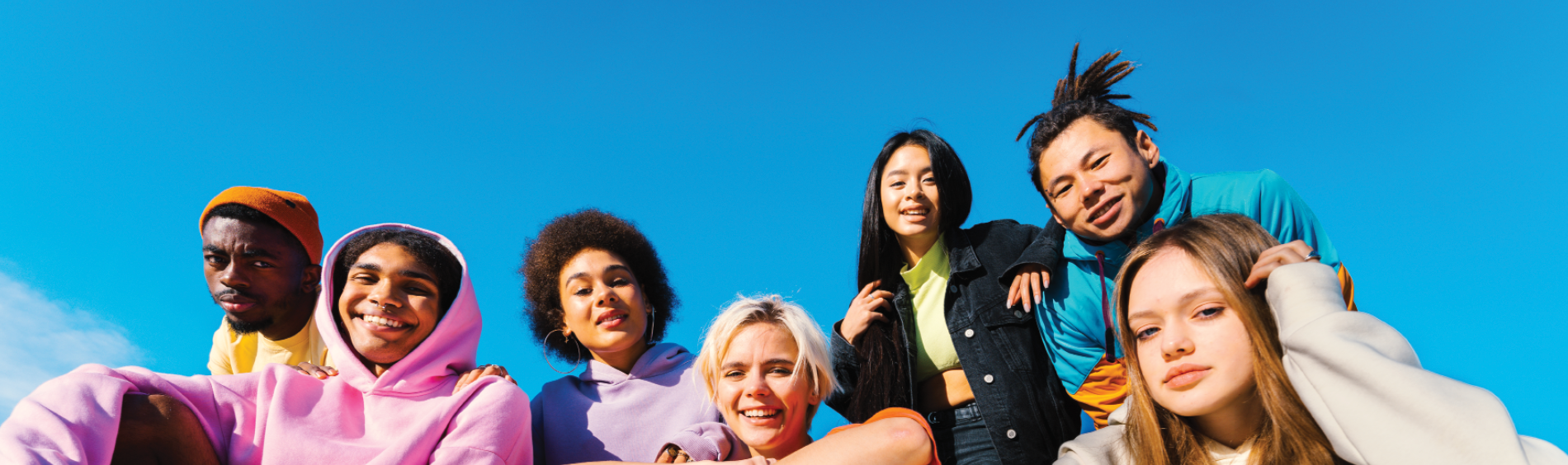 A group of teens sit together