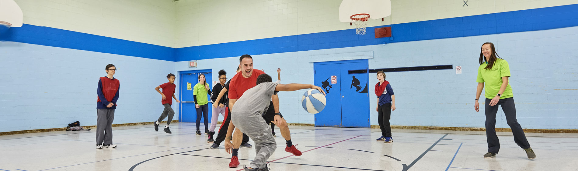 Image of playing basketball at Woodman Community Centre