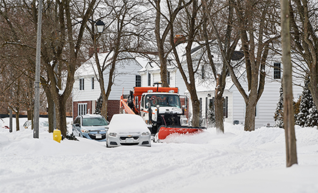 Snowplow clearing a street